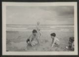 Caroline Hartley Lewis and three unidentified children playing in the sand on Miami Beach