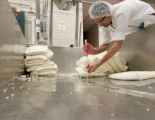 Making cheddar cheese in the Pilot Plant in the Food Science and Nutrition Building, St. Paul campus, University of MInnesota.