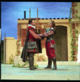 Two actors performing on stage in the 1998 UMD production of "The Betrothed"