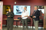 A speaker and two others at the Kirby Student Center renovation ribbon cutting ceremony