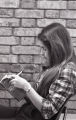 Student reading in library