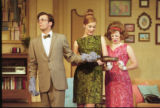 Three actors performing on stage in the 2001 UMD production of "Odd Couple"