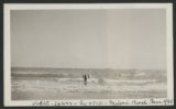 Judith Hartley wading in the surf with Jean and Guilford Sandilands Lewis at Miami Beach