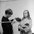 Student gets ID photo taken at Freshman Orientation