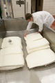 Making cheddar cheese in the Pilot Plant in the Food Science and Nutrition Building, St. Paul campus, University of MInnesota.